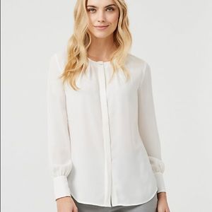 White crew neck blouse